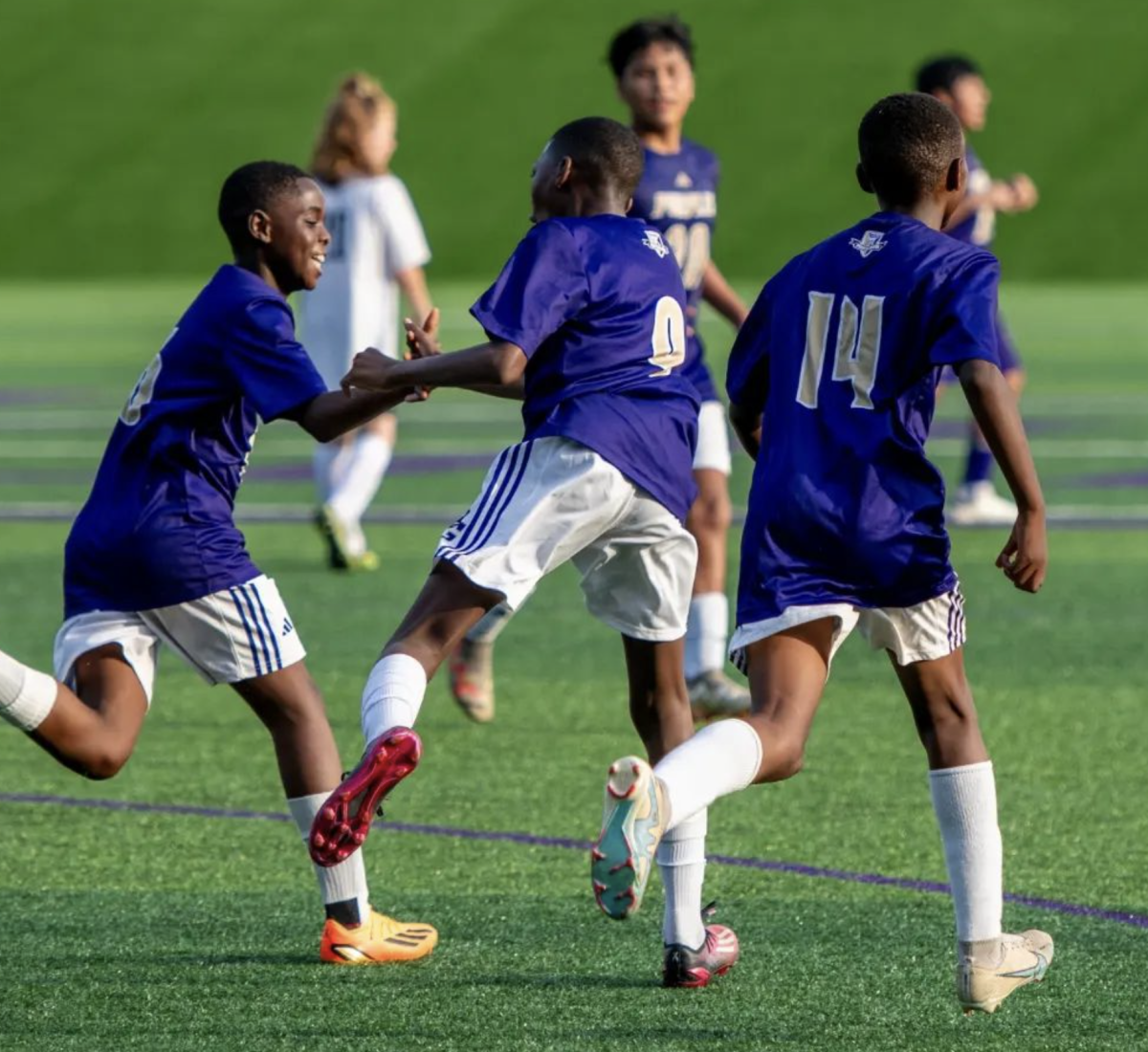 BGJHS Purples celebrating a goal on the Owensboro Red Devils on August 21st at the BGJHS pit